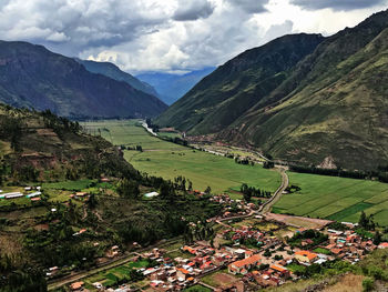 High angle view of landscape and mountains against sky