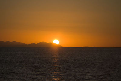 Scenic view of sunset over sea