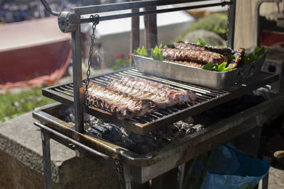 Close-up of meat on barbecue grill