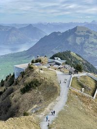 High angle view of townscape by sea against sky