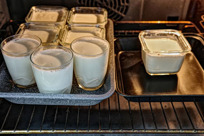 Home made yogurts in oven
