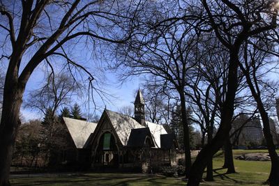 Built structure with trees in foreground