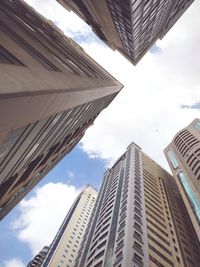 Low angle view of modern buildings against sky