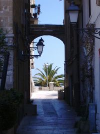 Narrow alley along buildings