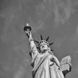 Low angle view of statue against sky