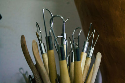 Close-up of paintbrushes on table