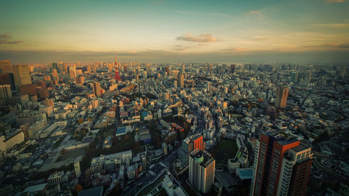 High angle view of modern buildings in city against sky