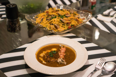 High angle view of soup served on table