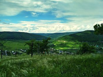 Scenic view of field against sky