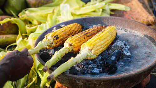 High angle view of meat on barbecue