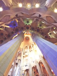 Low angle view of illuminated statue in temple