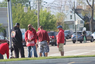 Group of people walking in front of building