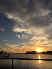 Scenic view of calm sea at sunset