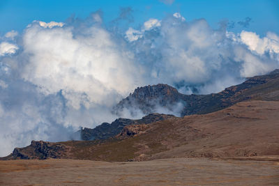 Panoramic view of volcanic landscape against sky