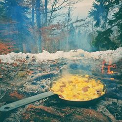 Scenic view of lake in forest during winter