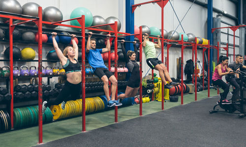 People exercising in gym