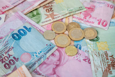 Close-up of paper currencies on table