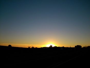 Silhouette of trees at sunset