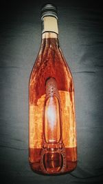 Close-up of beer bottle on table