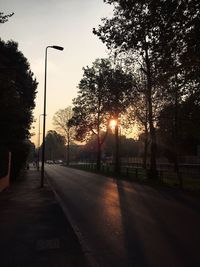 Street in city at sunset