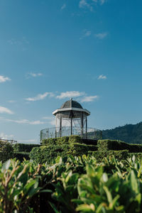 Built structure on land against sky