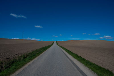 Straight road in hilly landscape, jutland