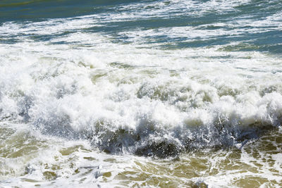 High angle view of waves in sea