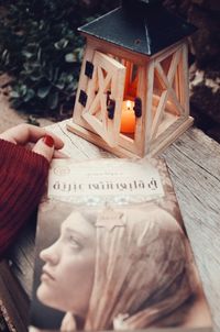 Close-up of woman reading book