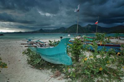 Scenic view of sea against cloudy sky