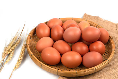 High angle view of eggs in basket