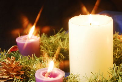 Close-up of lit tea light candle