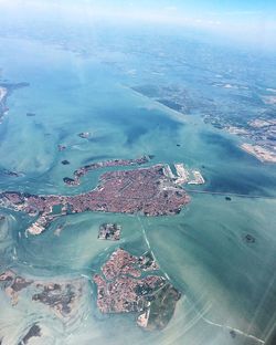 High angle view of sea seen through airplane window