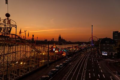 Fair and city at sunset