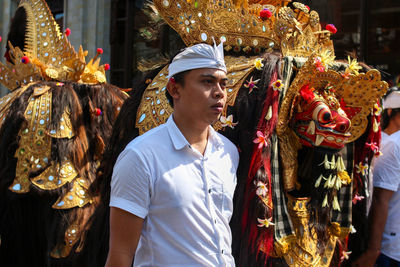 Young man wearing costume participating in parade