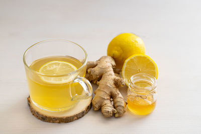 Yellow drink on glass table