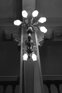 Low angle view of illuminated electric lamp