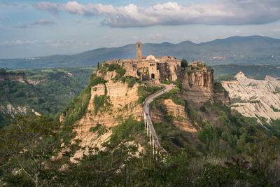 Civita di bagnoregio during a sunny day. defined  the dying city because it was built on a tuff spur