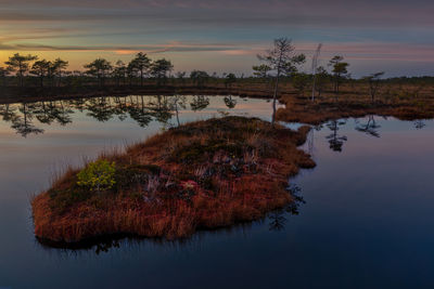 Scenic view of lake against sky during autumn