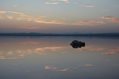 Scenic view of landscape against sky during sunset