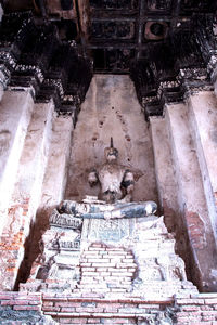 Low angle view of buddha statue