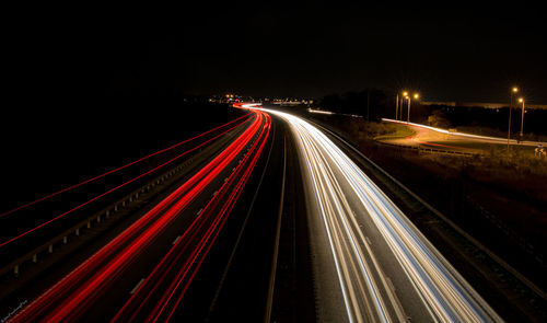 Light trails on road at night