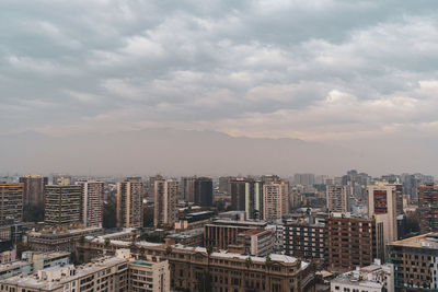 Cityscape against sky during sunset