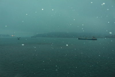 Scenic view of boats in sea