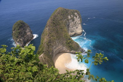 High angle view of rocks by sea