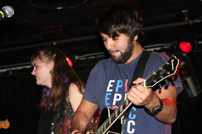 Young man playing guitar