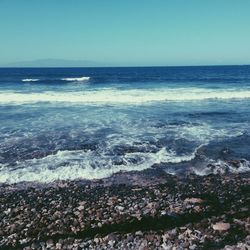 Scenic view of sea against clear sky