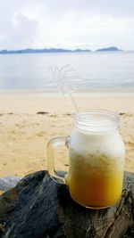 Cocktail on rock at beach