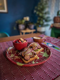 Close-up of food served on table at home