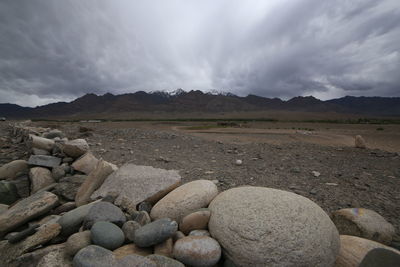 Rocks on land against sky