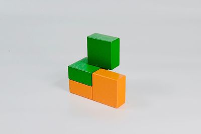 Close-up of toy over white background